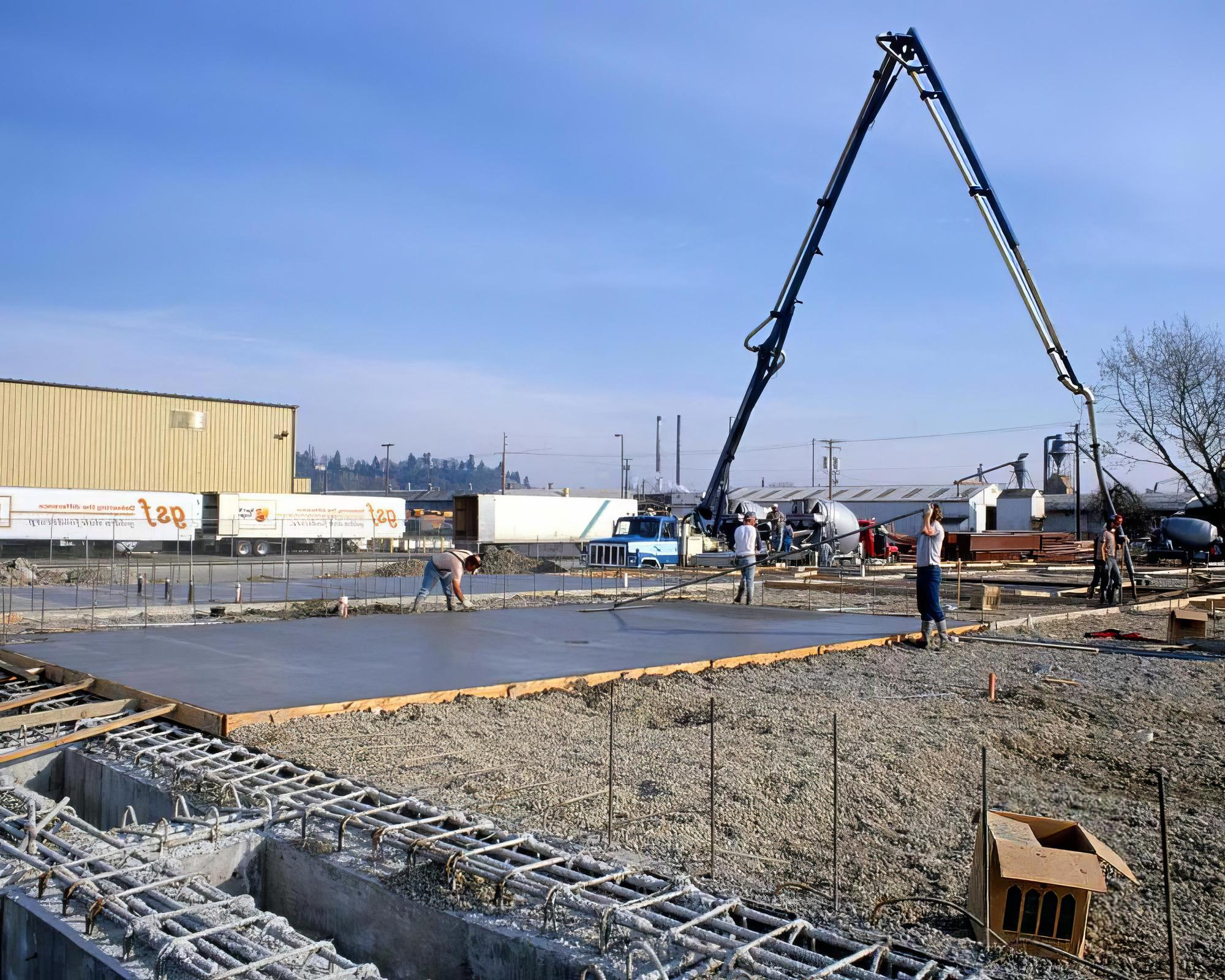 Commercial concrete slab pouring with boom pump – Concrete Pro Dallas