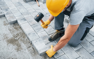 Hardscape paver installation with rubber mallet – Concrete Pro Dallas